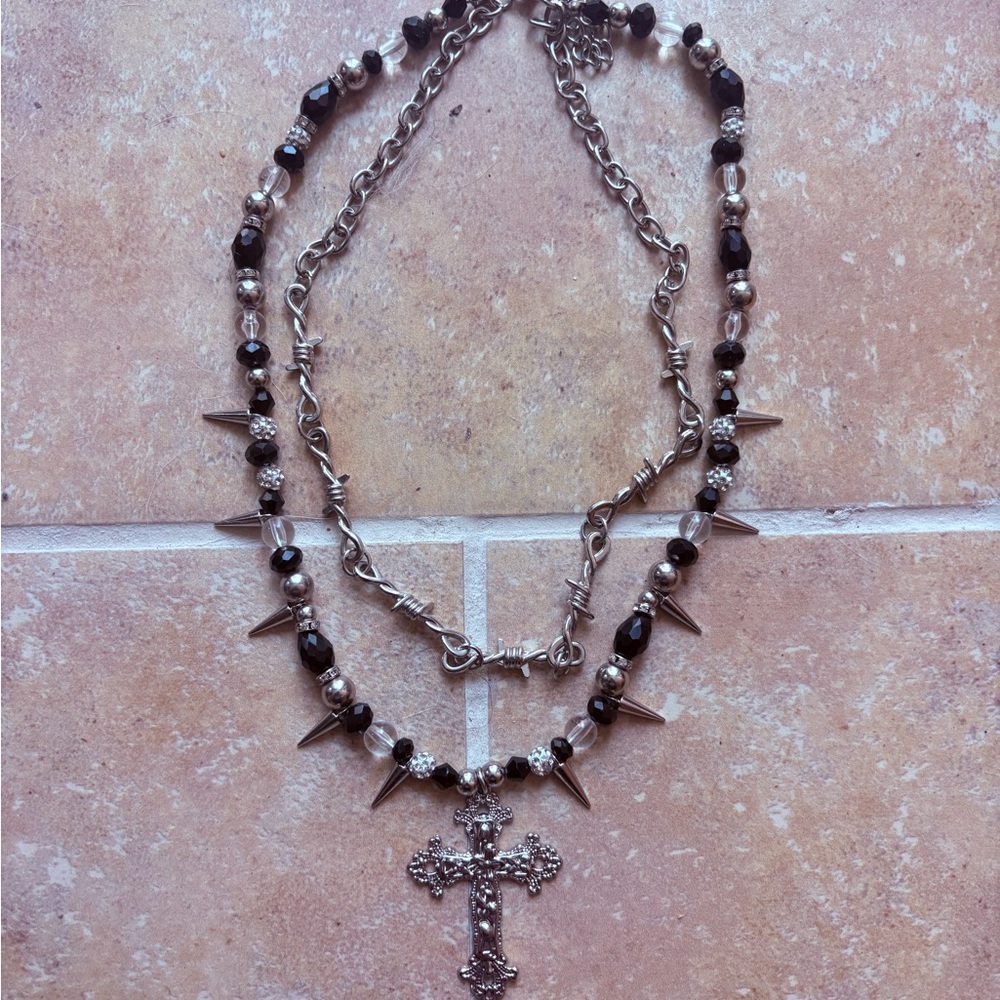 Silver and Black Multi-Strand Necklace with Ornate Cross Pendant